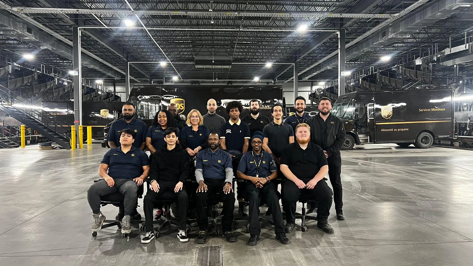 The people behind the shift. With my team in February 2024. I am seated second from the left.